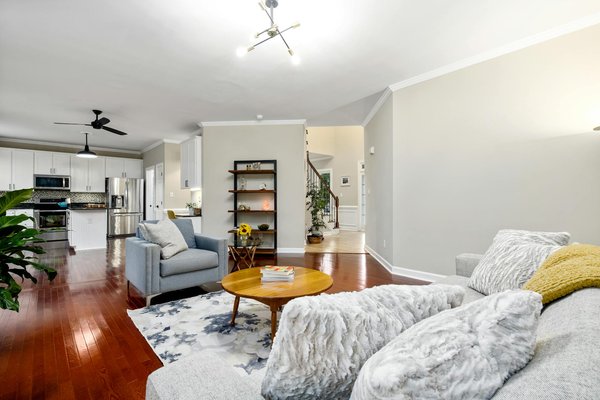 How do government policies influence the UK real estate finance sector?